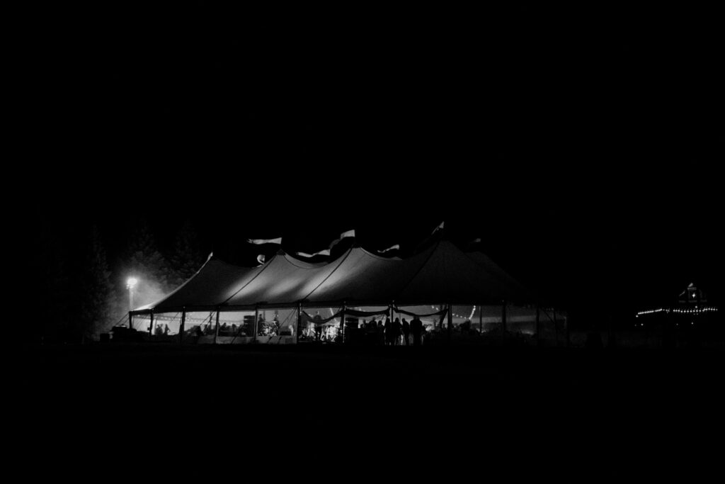 Sailcloth tent from Event Essentials for an outdoor wedding reception in Wisconsin, photo by Florapine Photography