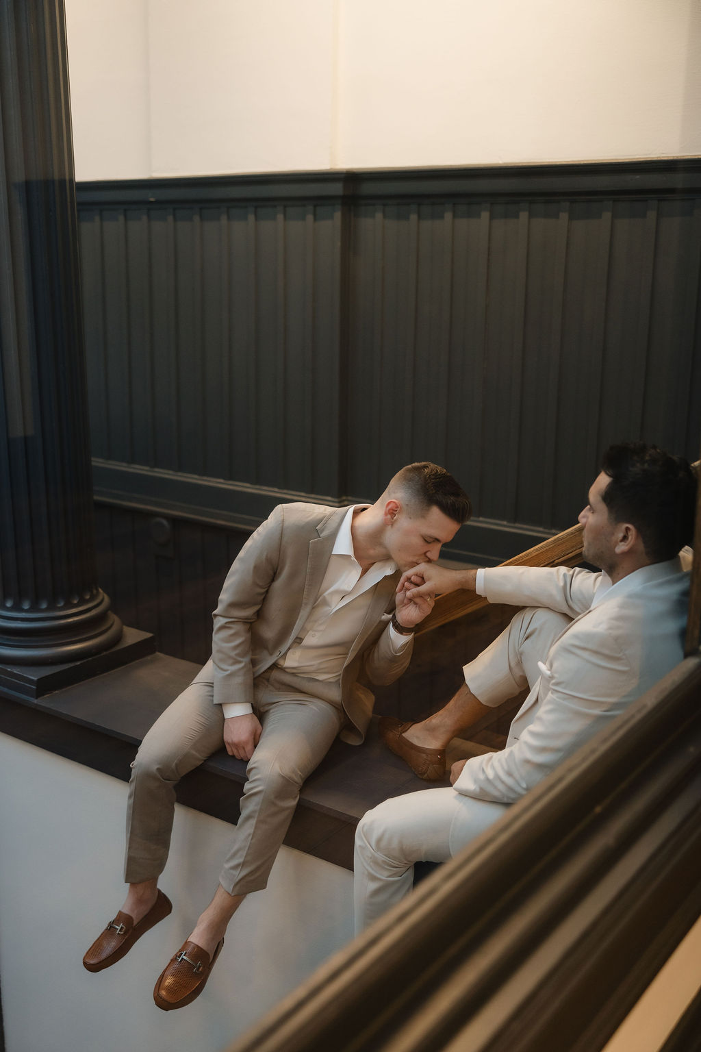 Wedding couple portraits on staircase at Ellsworth Block in downtown Madison, WI